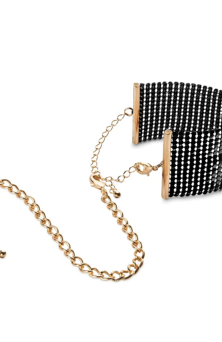 Black metallic cuffs with gold chain