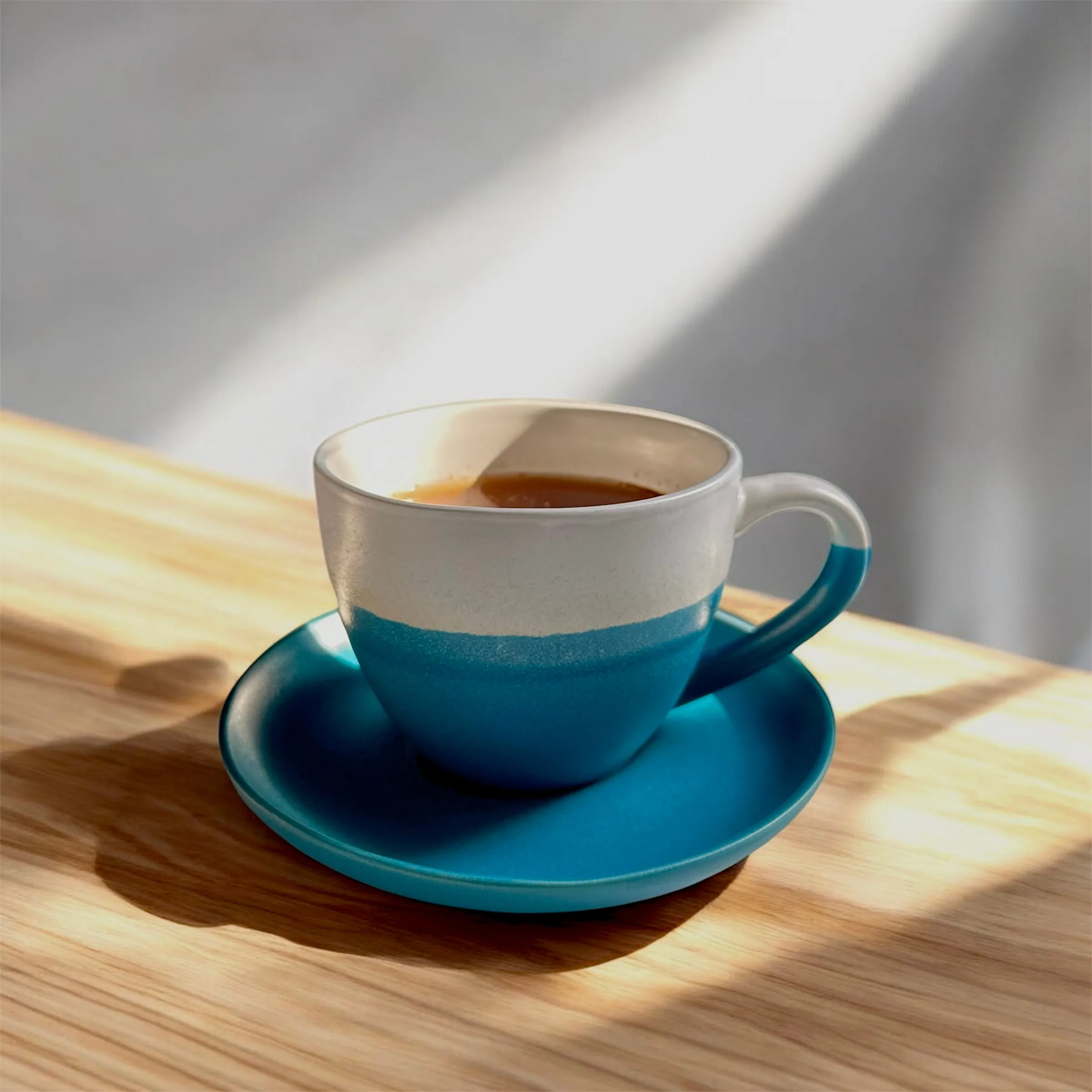 Minimalist Ceramic Coffee Cup with Saucer